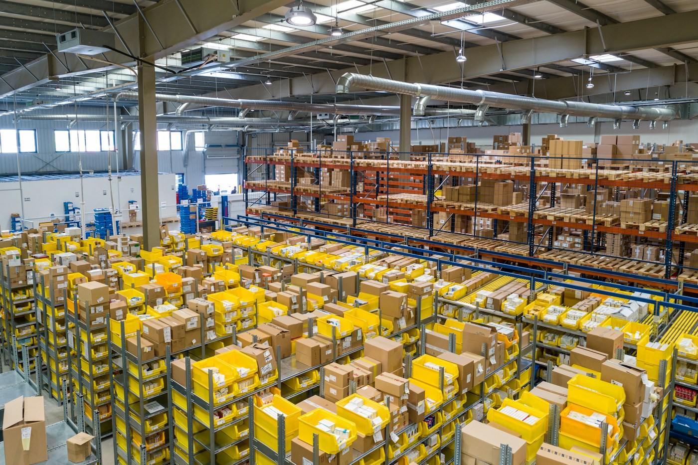Cargo handling in a logistics warehouse, illustrative photography